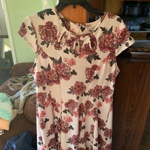 cream dress with roses